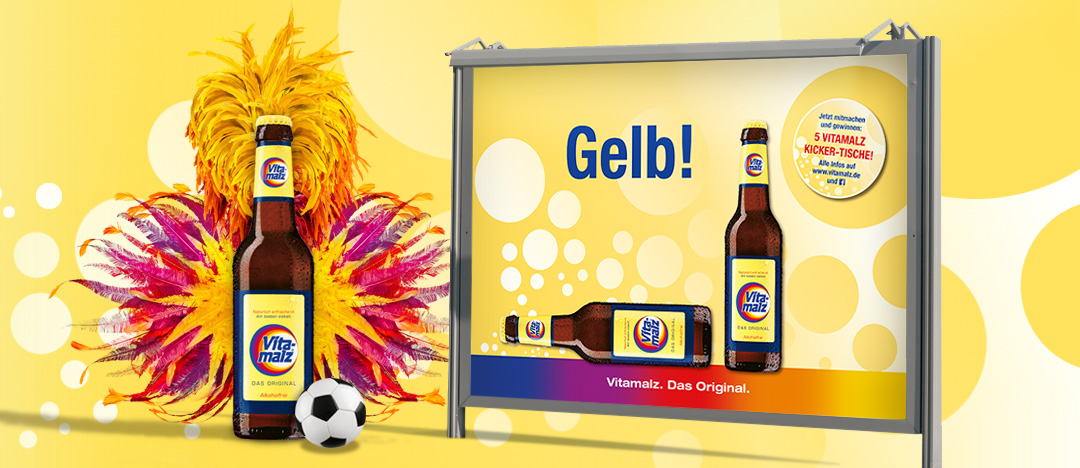 Das 18/1 Motiv „Gelb!“ und eine Vitamalz Flasche mit brasilianischem Samba-Schmuck zur Vitamalz Sommerkampagne 2014